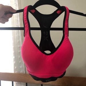 red Victoria’s Secret sports bra